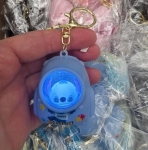 Стич в рюкзаке - брелок светящийся